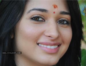 Tamanna's double commitment to Allu Aravind?