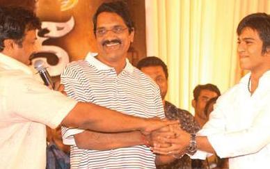 Charan with Ashwini Dutt