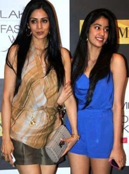 Mother Focused on Daughter's Debut