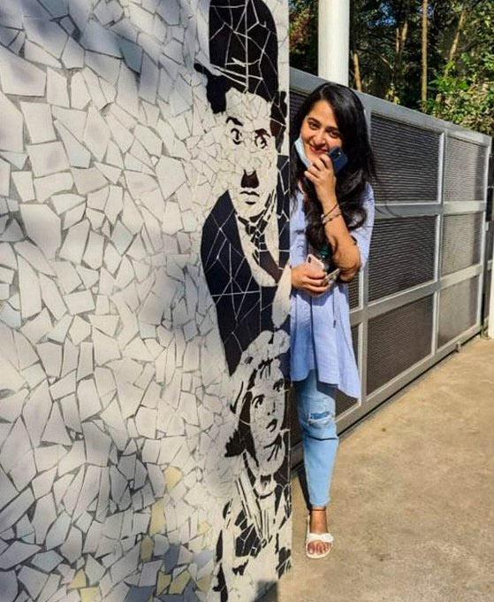 Anushka next to Charlie Chaplin