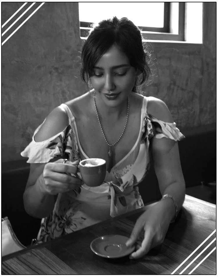 Neha Sharma warming up at the cafe