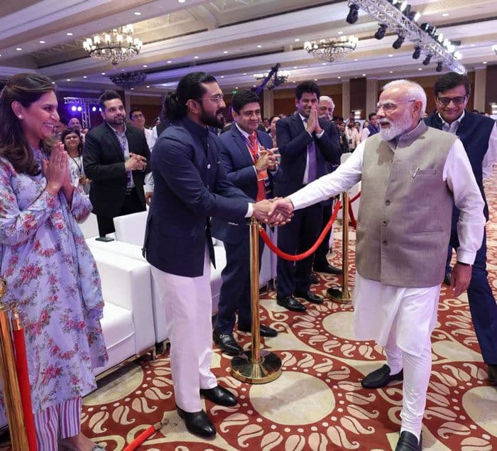 Ram Charan snapped with PM Modi at R Summit