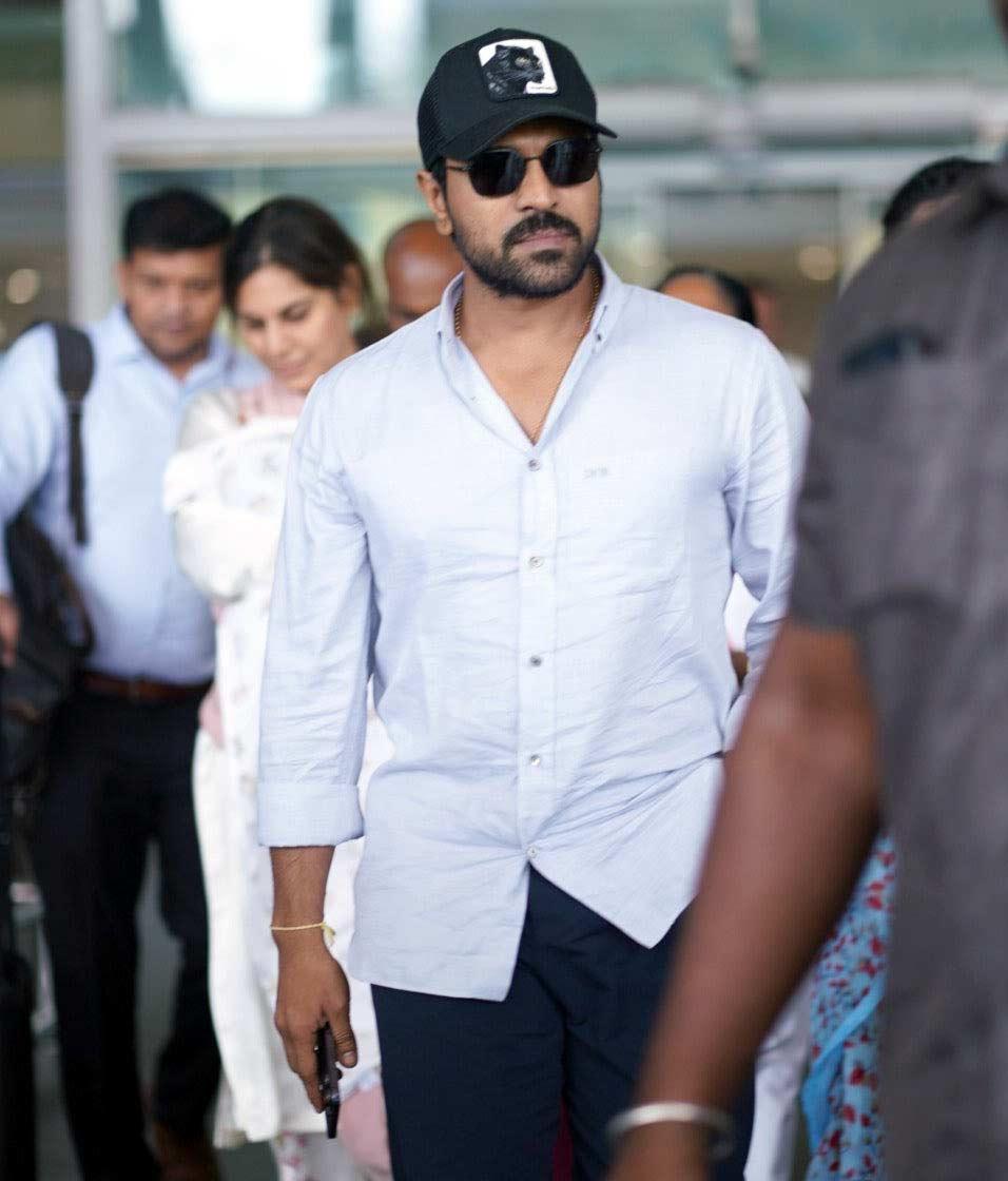 Ram Charan, Upasana hides Klinkara face at Airport