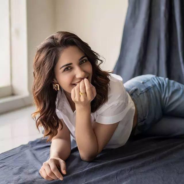 Ruhani captivates in a white dress