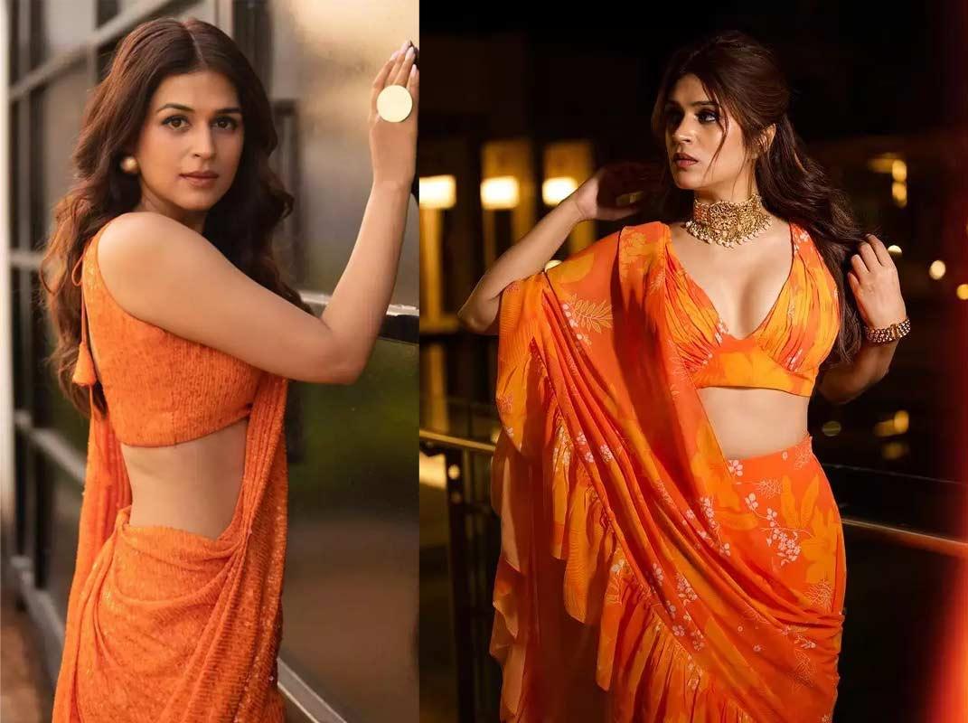 Shraddha Das turns sensuous in orange saree