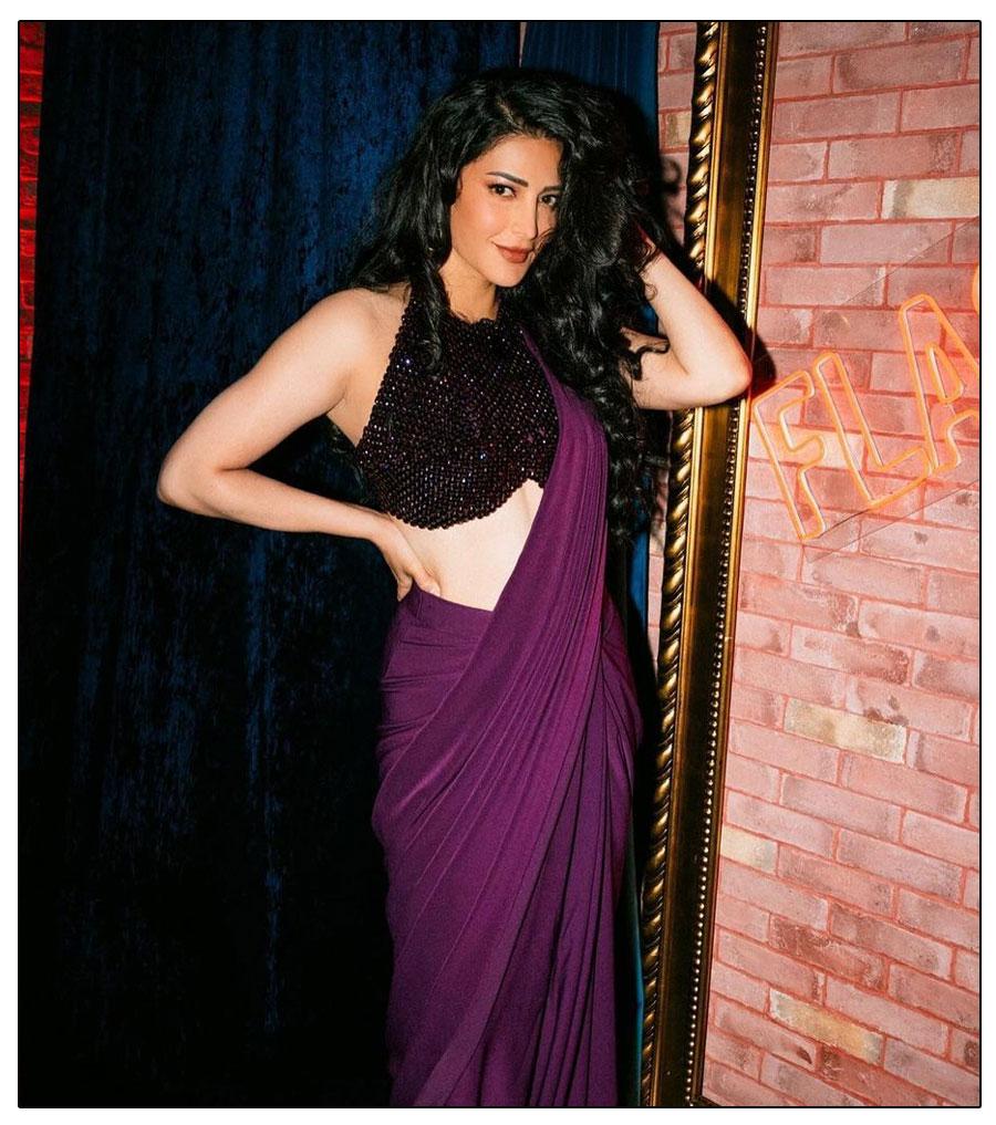 Shruti Haasan Stuns In Vibrant Purple Saree