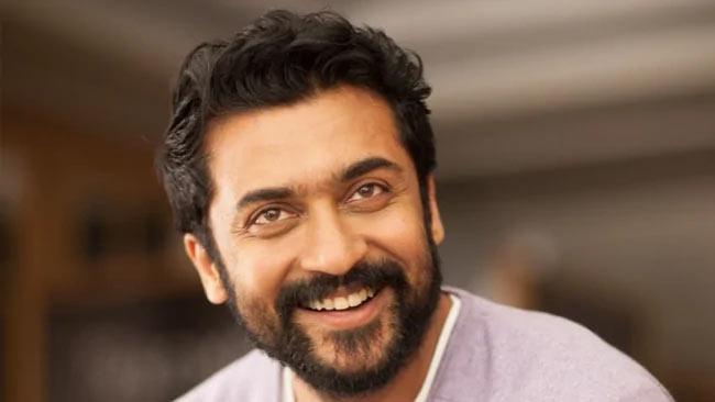 Suriya teaming with which Tollywood director?