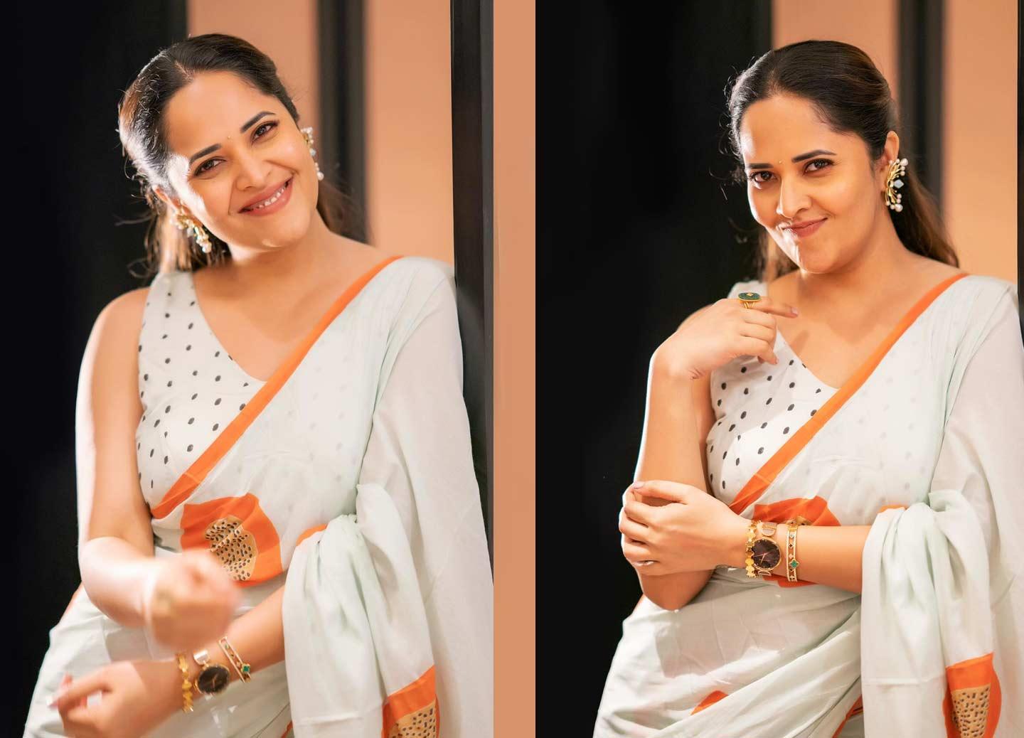 Anasuya looks beautiful in a white saree