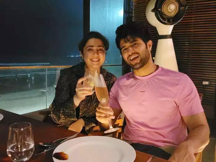 Vijay Devarakonda-Charmi celebrating Liger Trailer Success