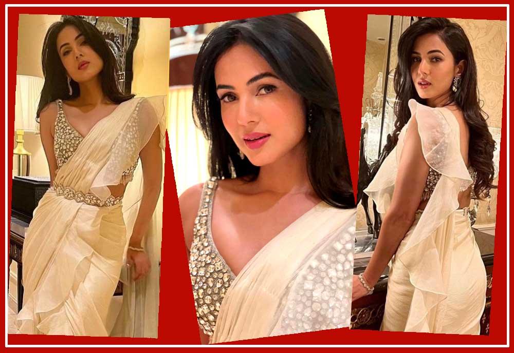 Sonal Chauhan turns sensuous in white saree