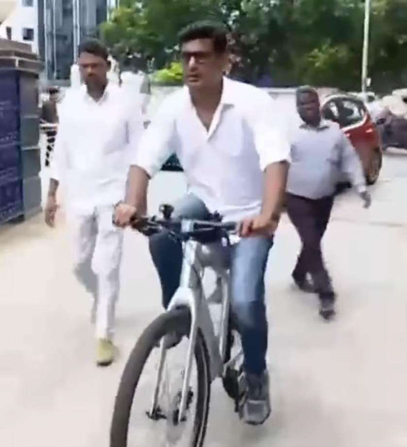 Vishal comes to South Indian Artist Association meeting on cycle