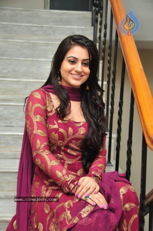 Aksha New Stills - 37 / 56 photos