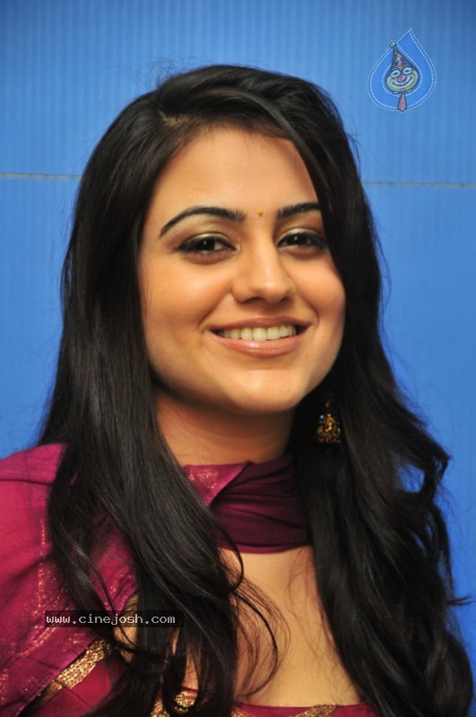 Aksha New Stills - 49 / 56 photos