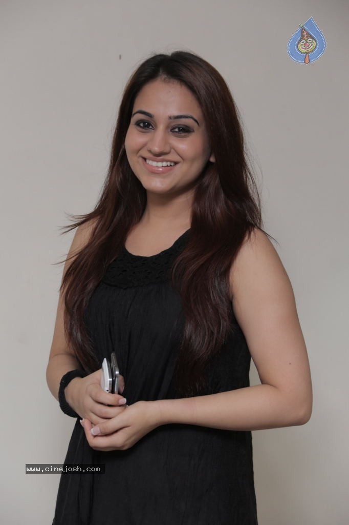 Aksha New Stills - 21 / 47 photos