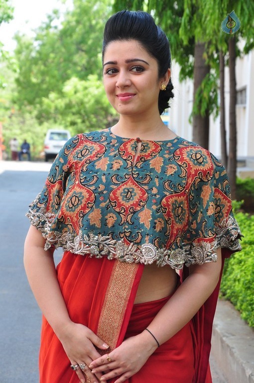 Charmy Kaur Photos - 55 / 61 photos