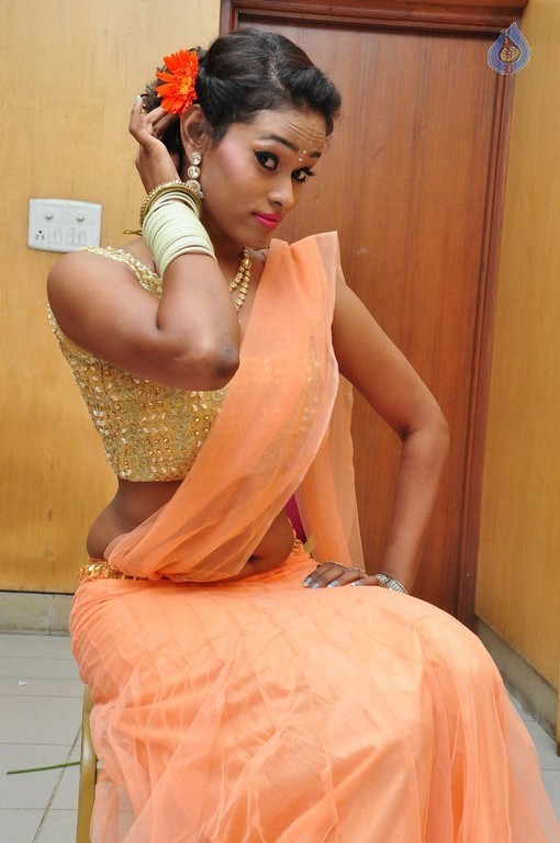 Dancer Nisha Pics - 12 / 18 photos