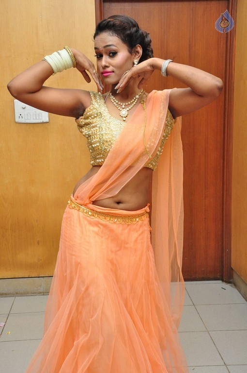 Dancer Nisha Pics - 16 / 18 photos