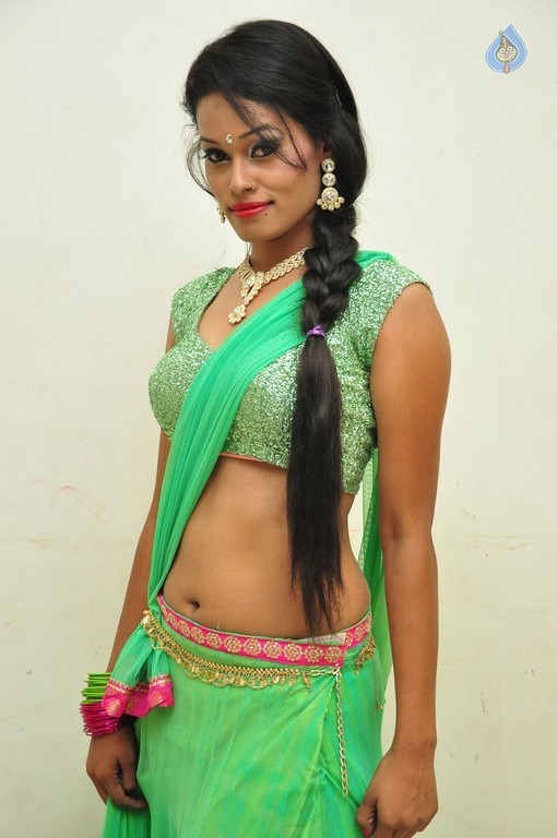 Nisha New Pics - 21 / 24 photos