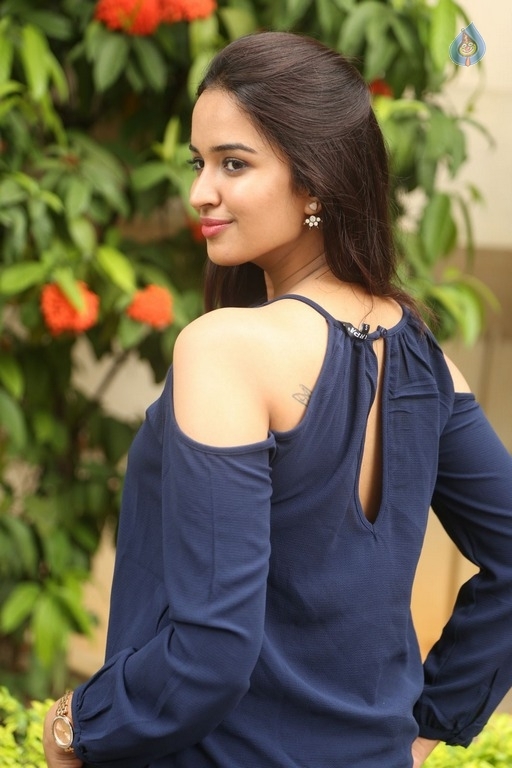 Poojitha New Pics - 23 / 31 photos