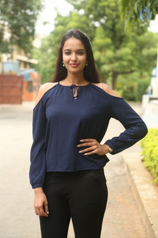 Poojitha New Pics - 27 / 31 photos