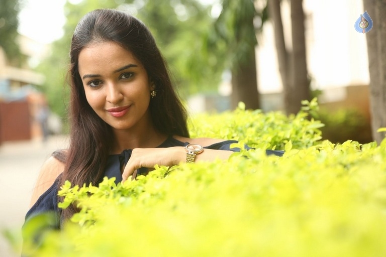 Poojitha New Pics - 28 / 31 photos