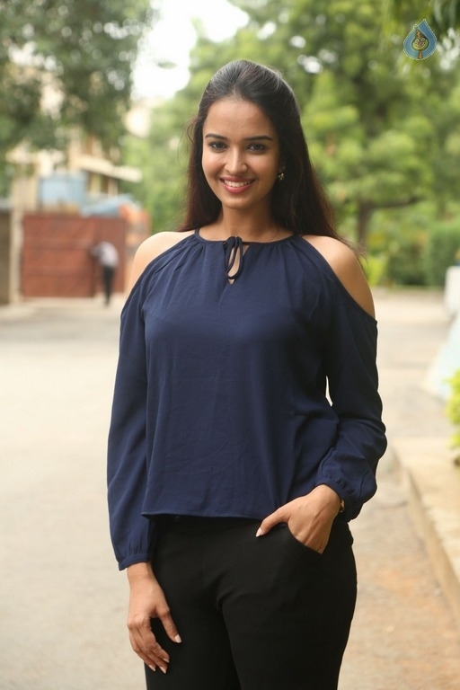 Poojitha New Pics - 29 / 31 photos