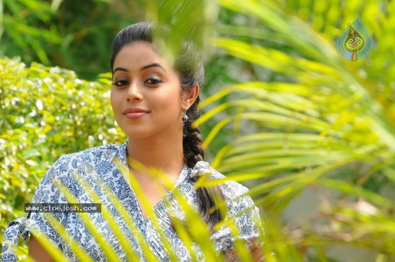 Poorna New Stills - 26 / 29 photos