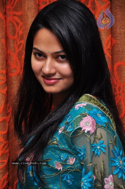 Suhasini New Stills - 1 / 27 photos