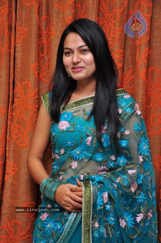 Suhasini New Stills - 12 / 27 photos