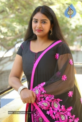 Actress Poorni Photos - 2 of 12