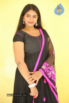 Actress Poorni Photos - 5 of 12