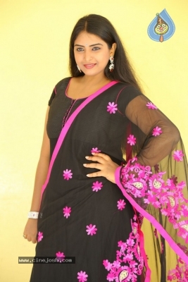 Actress Poorni Photos - 6 of 12