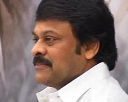 Roshaiah offers chocolate to Chiru.