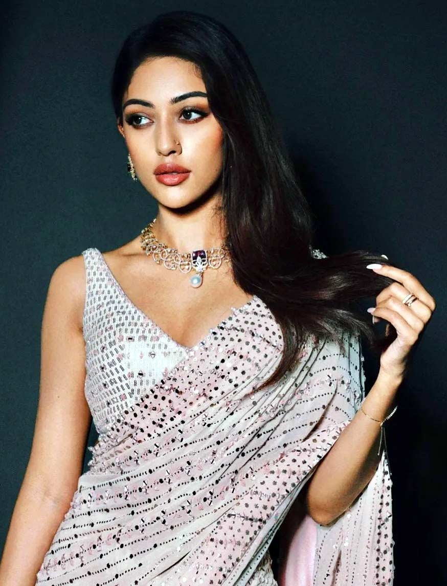 Anu Emmanuel turns voluptuous in orange | cinejosh.com