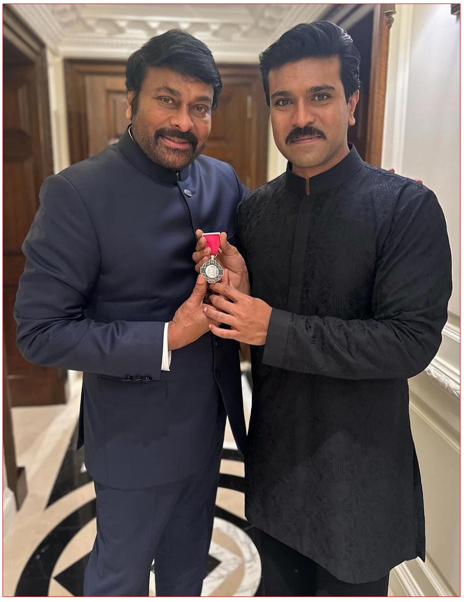  Chiranjeevi - Ram Charan Pose With Padma Vibhushan