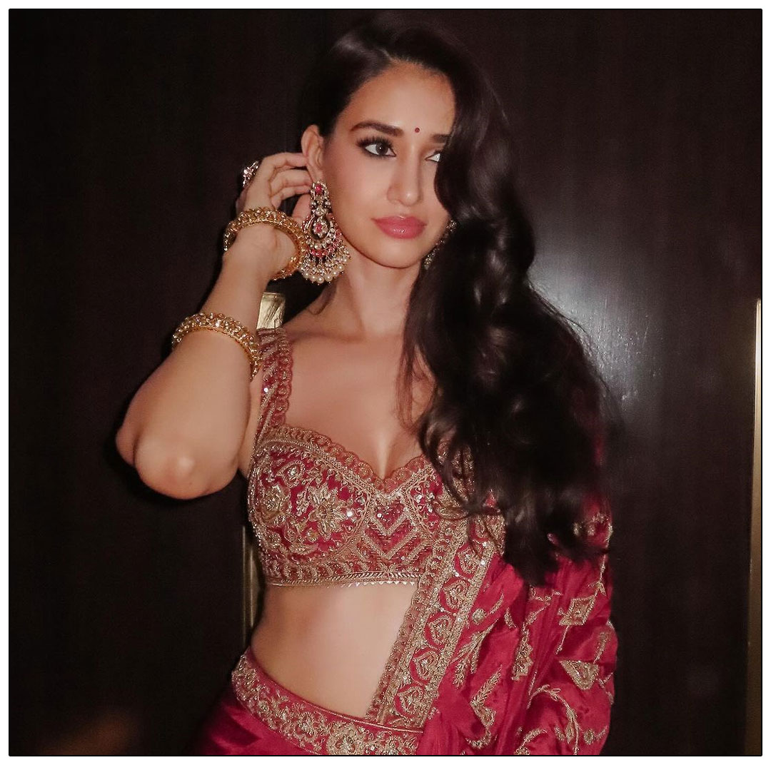 Disha Patani Radiates Glamour in Stunning Red Dress