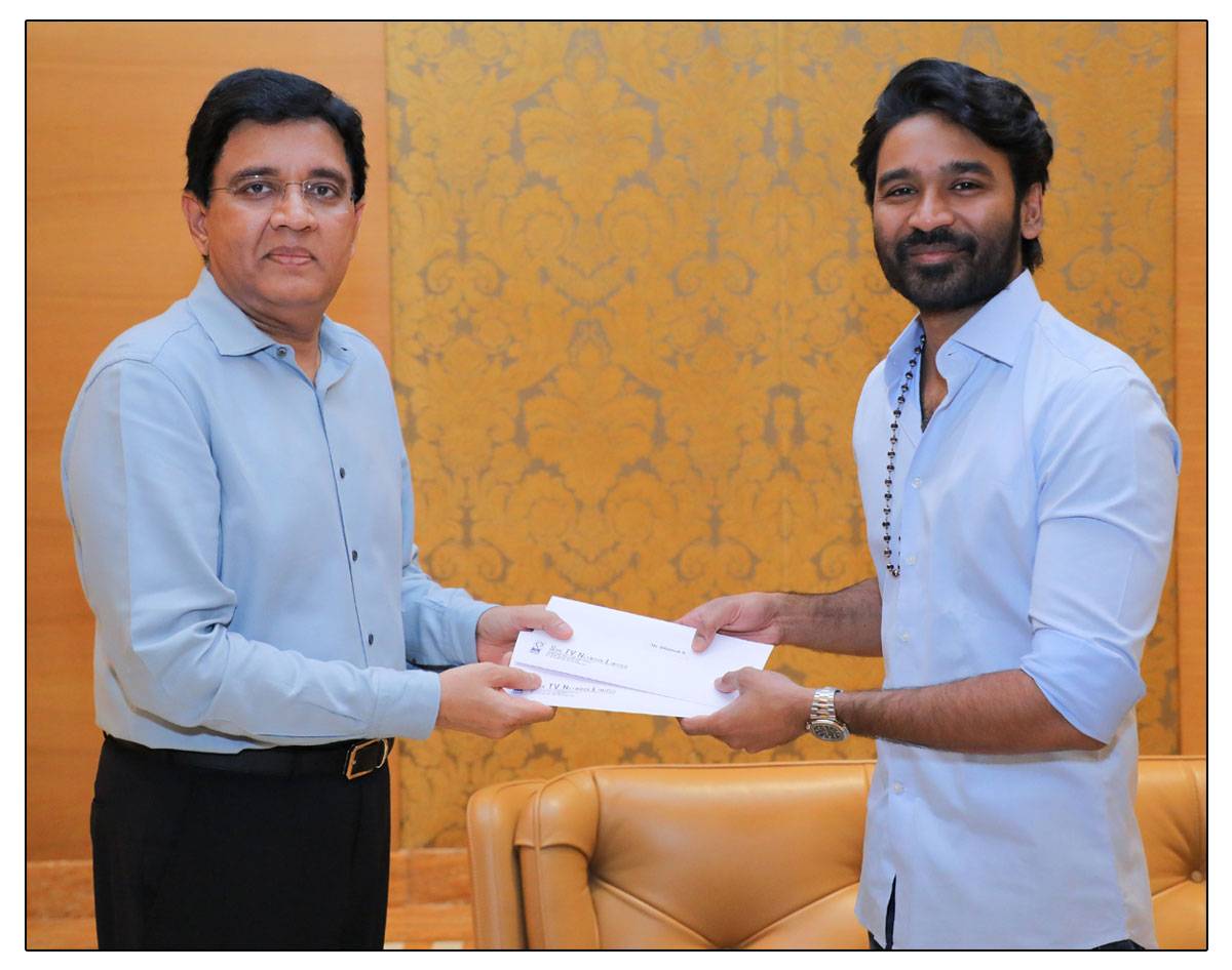 Kalanithi Maran congratulated Dhanush and presented two cheques