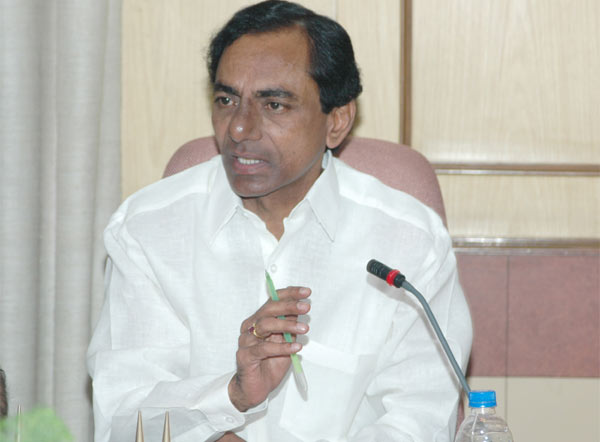 KCR asks officials to speed up works on 2BHK houses