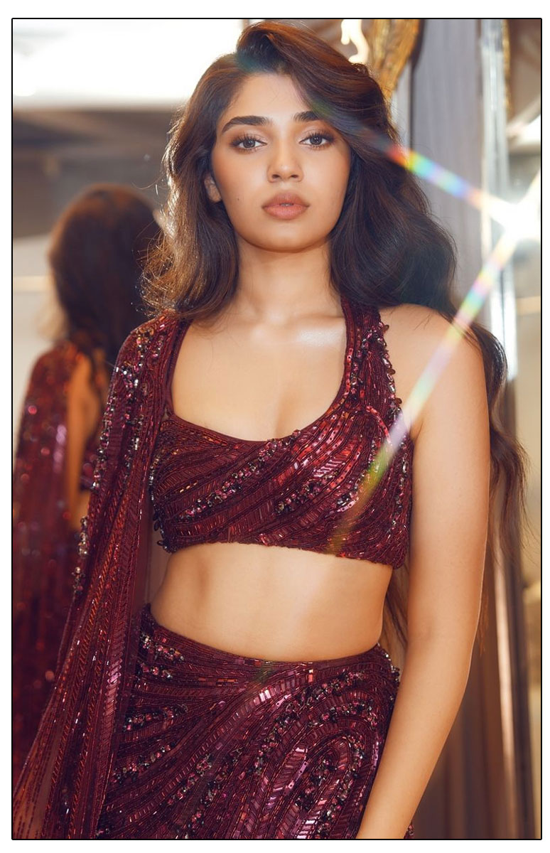 Krithi Shetty Exuding Elegance and Happiness In maroon lehenga 