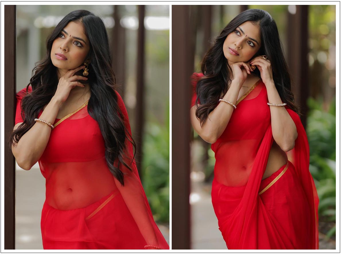 Malavika Mohanan showcasing her in a stunning red saree