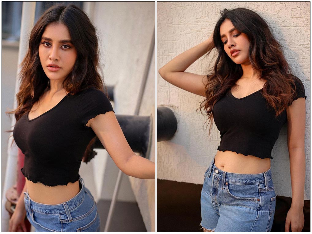 Nabha Natesh Mesmerise In Black Crop And Blue Denim