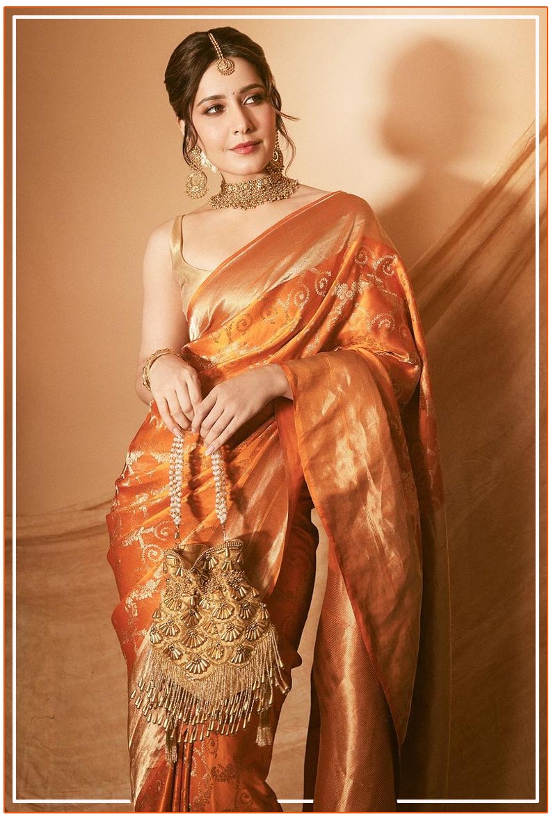 Raashii Khanna captivated  in a breathtaking tangerine saree