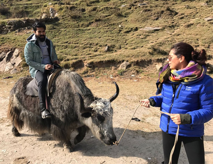 Ram Charan Rides on a Buffalo