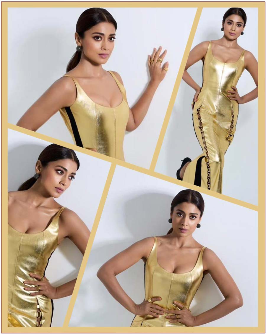 Shriya Saran gillters in gold attire