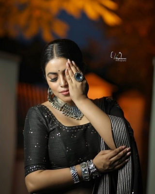 Poorna Photos - 11 of 15