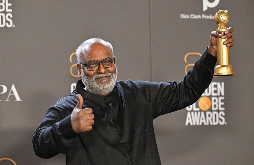 golden globe award,rrr,naatu naatu song,rrr movie,mm keeravani,ram charan,ntr,rajamouli  నాటునాటుకి గోల్డెన్ గ్లోబ్.. RRR రికార్డ్